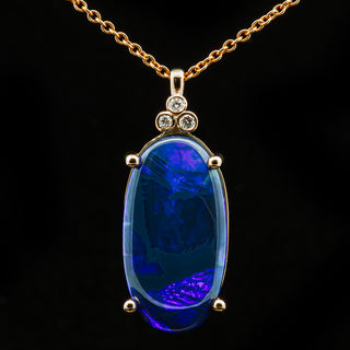 Australian Blue-Purple Black Oval Opal with Trio of Diamonds in Yellow Gold by World Treasure Designs