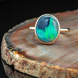 Blue-Green Australian Semi-Black Opal Ring in Yellow Gold by World Treasure Designs