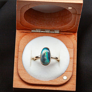 Rainbow Australian Fossil Semi-Black Opal Ring in Yellow Gold by World Treasure Designs