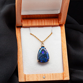 Australian Purple-Blue Black Opal Pendant with Trio of Diamonds in Yellow Gold by World Treasure Designs