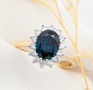 Australian Blue Sapphire Ring with a Halo of Diamonds in Yellow and White Gold by World Treasure Designs