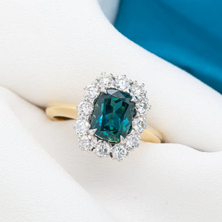 Australian Blue-Teal Cushion Cut Sapphire and Diamond Halo Ring in Yellow and White Gold by World Treasure Designs