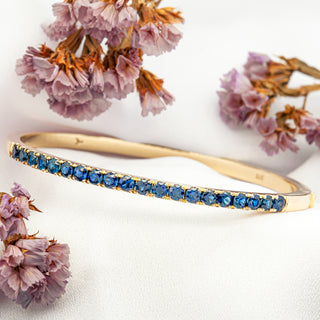 Australian Royal Blue Sapphire Bangle in Yellow Gold by World Treasure Designs