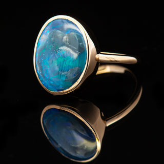Blue Australian Fossil Shell Opal Ring in Yellow Gold by World Treasure Designs