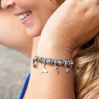 Dolphin Charm in Sterling Silver by World Treasure Designs