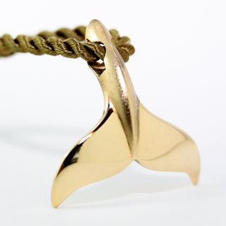 Gold Whale Tail Necklace by World Treasure
