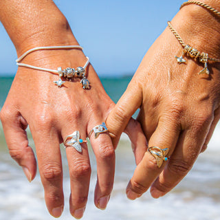Mother and Calf Engraved Humpback Whale Tail Rings in Sterling Silver and Yellow Gold by World Treasure Designs