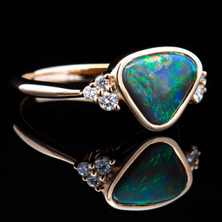 Multicoloured Australian Black Opal Ring with Trio of Diamonds on either side in Yellow Gold by World Treasure Designs