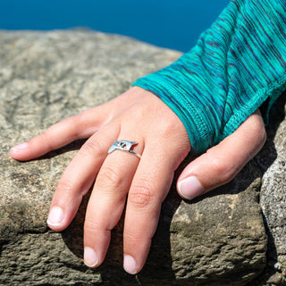 Whale Tail Blue Sapphire Embrace and Protect Ring in Sterling Silver by World Treasure Designs