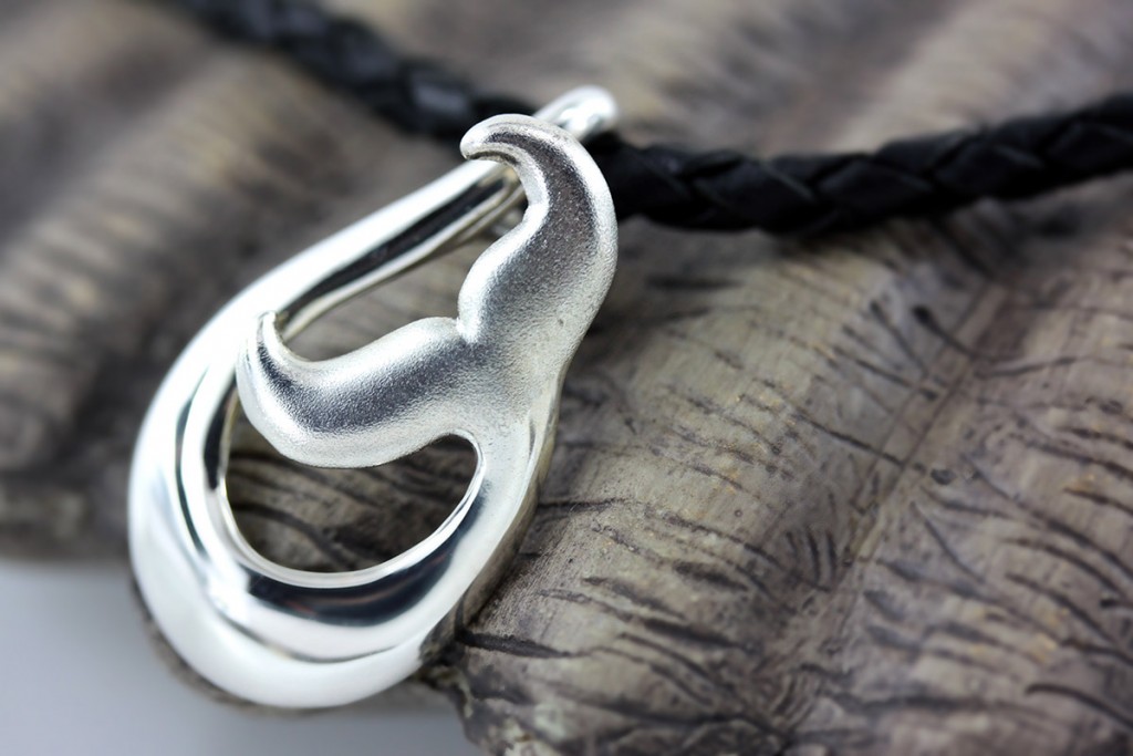 sterling silver artistic whale fluke pendant on black leather necklace