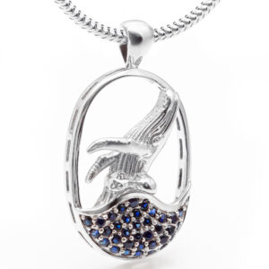 Silver Breaching Humpback Whale Necklace by World Treasure Designs