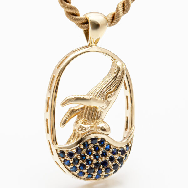 Humpback Whale Jumping in Yellow Gold with Blue Sapphires by World Treasure Designs