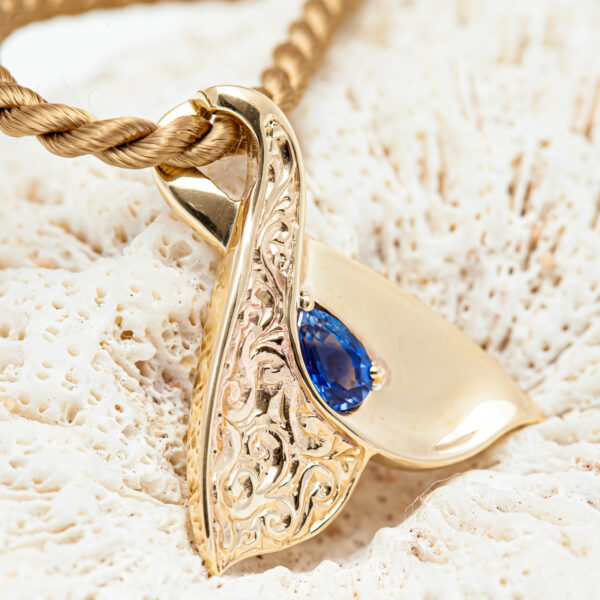 Engraved Eternity Whale Tail Necklace with Blue Sapphire in Yellow Gold by World Treasure Designs