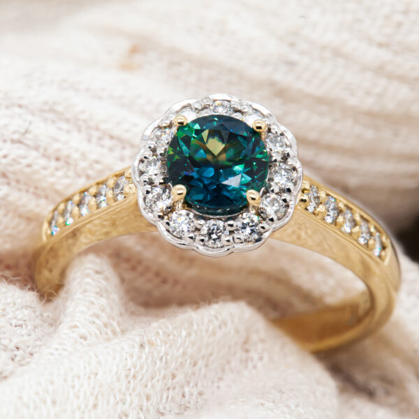 Australian Blue Parti Sapphire Ring with Halo of Diamonds in White and Yellow Gold by World Treasure Designs
