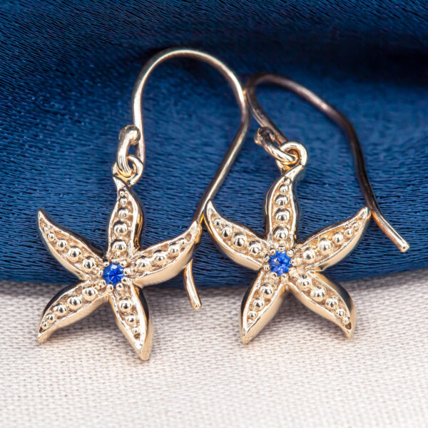 Gold Sea Star Earrings with Blue Sapphire by World Treasure Designs
