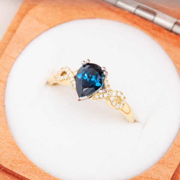 Australian Blue Pear Shaped Sapphire and Diamond Ring in Yellow and White Gold by World Treasure Designs