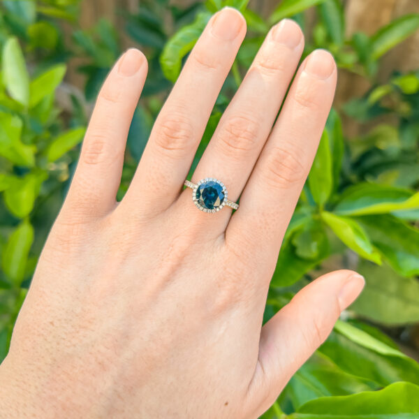 Large Teal-Blue Parti Sapphire and Diamond Halo Ring in Yellow and White Gold by World Treasure Designs