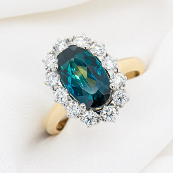 Australian Blue Parti Sapphire Ring with Diamond Halo in Yellow and White Gold by World Treasure Designs
