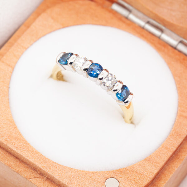 Australian Blue Sapphire Ring with two Diamonds in Yellow and White Gold by World Treasure Designs
