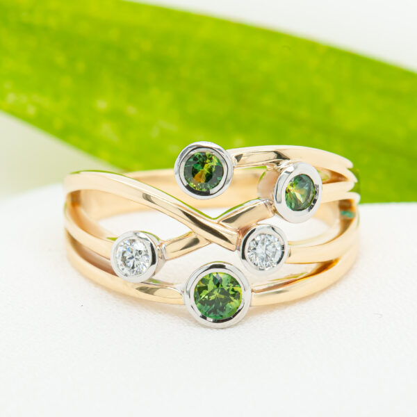 Australian Green Sapphire Ring with two Diamonds in Yellow and White Gold by World Treasure Designs