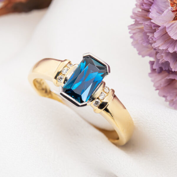 Australian Blue Sapphire Radiant Cut in White and Yellow Gold by World Treasure Designs