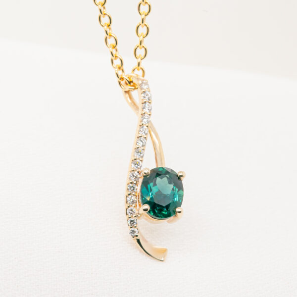 Australian Blue-Green Parti Sapphire Pendant with a Twist in Yellow Gold by World Treasure Designs