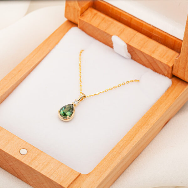 Pear Cut Australian Green-Blue Parti Necklace with a Diamond in Yellow Gold by World Treasure Designs