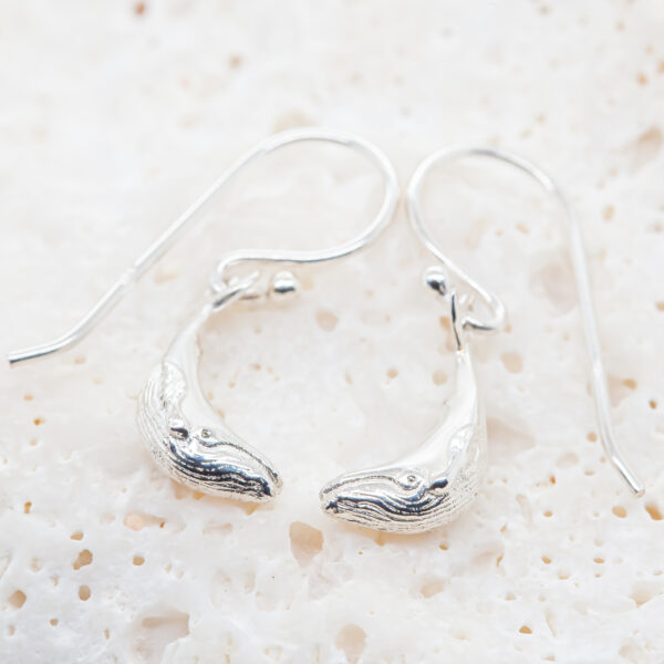 A Pair of Humpback Whale Earrings in Sterling Silver by World Treasure Designs