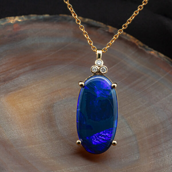 Australian Oval Blue-Purple Black Opal Pendant with Diamonds in Yellow Gold by World Treasure Designs