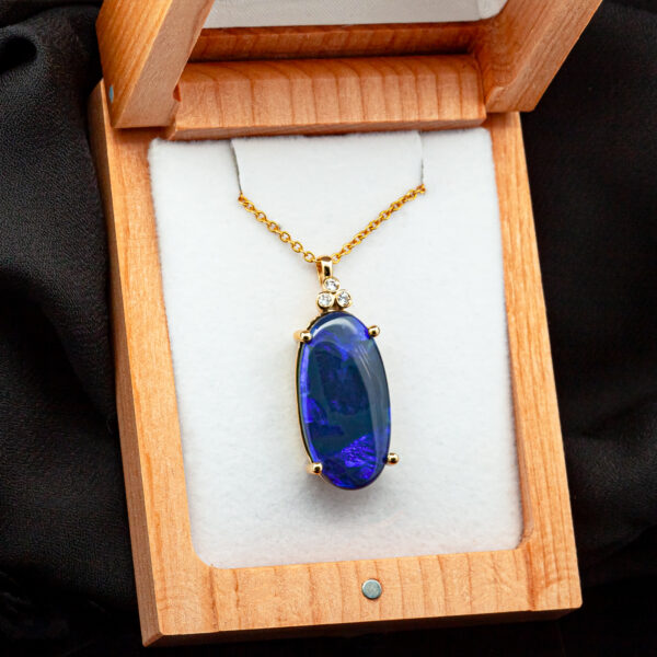 Australian Blue-Purple Black Opal Pendant with Trio of Diamonds in Yellow Gold by World Treasure Designs
