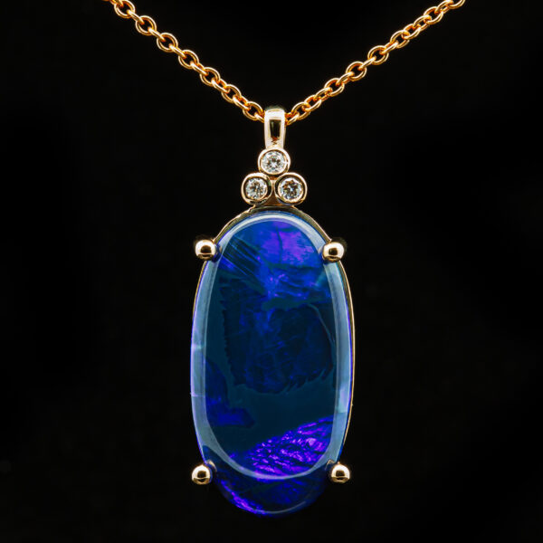 Australian Blue-Purple Black Oval Opal with Trio of Diamonds in Yellow Gold by World Treasure Designs