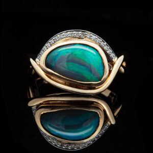 Australian Teal Black Opal Ring with Diamonds in White and Yellow Gold by World Treasure Designs