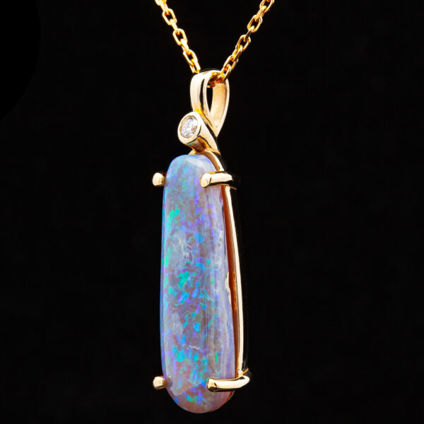 Elongated Australian Blue-Green Black Opal Necklace with a Diamond in Yellow Gold by World Treasure Designs