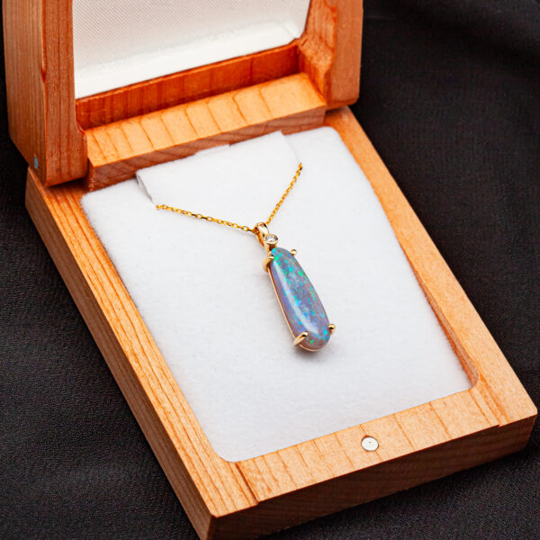 Elongated Australian Blue-Green Black Opal and Diamond Necklace in Yellow Gold by World Treasure Designs
