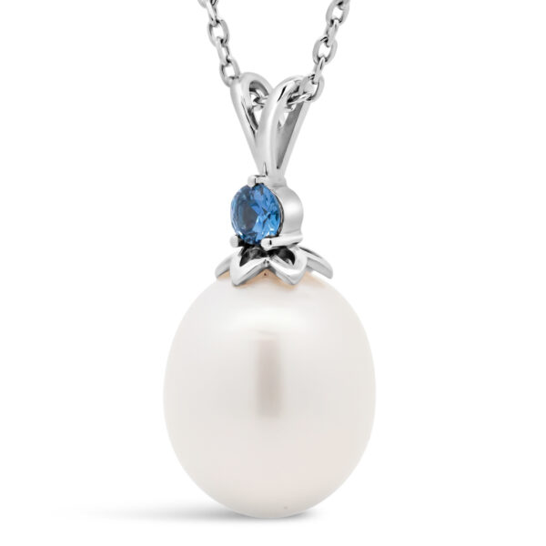 Australian Blue Sapphire on top of Australian South Sea Pearl Set in White Gold by World Treasure Designs