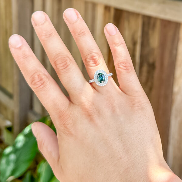 Hand Picture of Australian Teal-Blue Parti Sapphire Ring in Platinum by World Treasure Designs