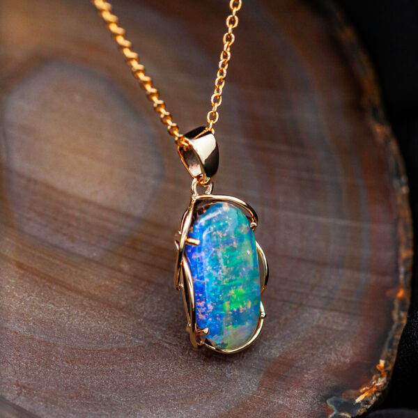 Australian Boulder Crystal Opal Pendant with intricate Yellow Gold Setting by World Treasure Designs