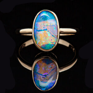 Australian Fluorescent Black Opal Ring Bezel Set in Yellow Gold by World Treasure Designs