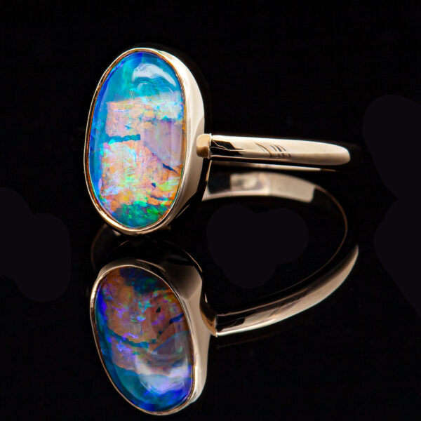 Fluorescent Australian Black Opal Ring Bezel Set in Yellow Gold by World Treasure Designs
