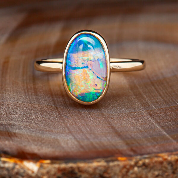 Blue Pink Orange Yellow Green Opal Fluorescent Australian Black Opal Ring Set in Yellow Gold by World Treasure Designs