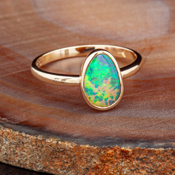 Multicoloured Australian Crystal Opal Rainbow Opal Ring in Yellow Gold by World Treausre Designs