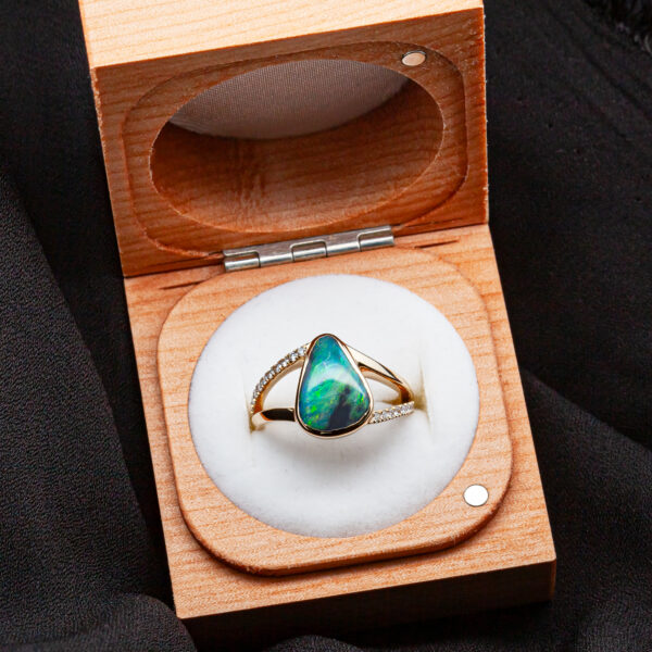 Split Shank Diamond and Australian Black Opal Ring Bezel Set in Yellow Gold by World Treasure Designs