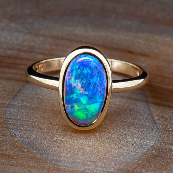 Australian Crystal Opal Ring Bezel Set in Yellow Gold by World Treasure Designs