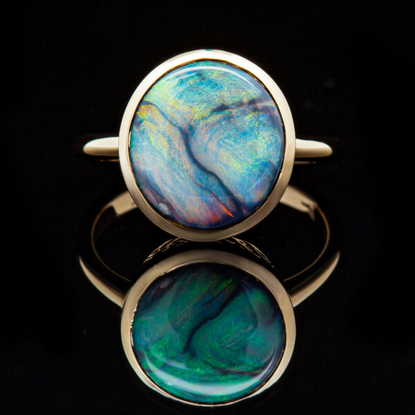 Australian Semi-Black Opal Ring Bezel Set in Yellow Gold by World Treasure Designs