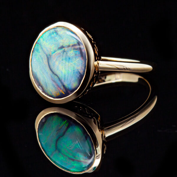 Bezel Set Australian Semi-Black Opal Ring in Yellow Gold by World Treasure Designs