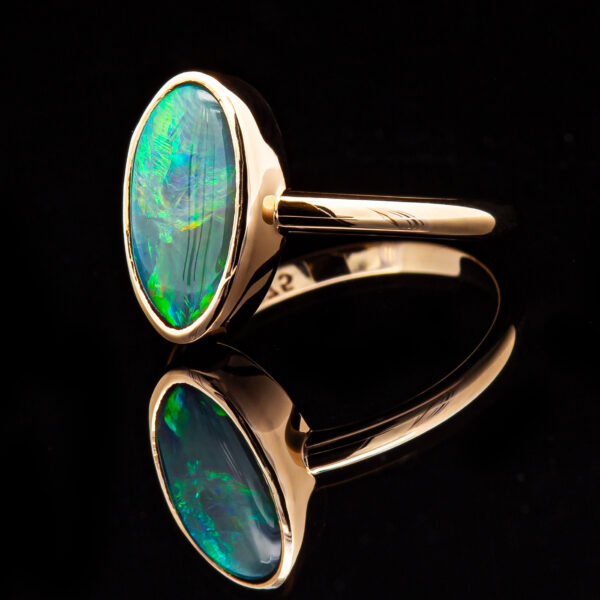 Blue-Green Australian Crystal Opal Bezel Set Ring in Yellow Gold by World Treasure Designs