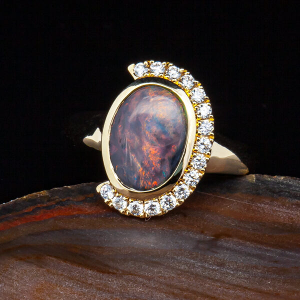 Australian Semi-Black Opal Ring with Half Diamond Halo in Yellow Gold by World Treasure Designs