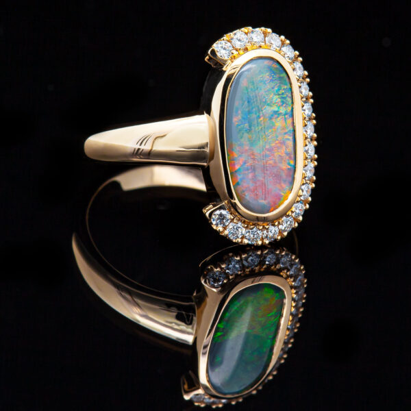 Australian Semi-Black Opal Ring with Partial Diamond Halo in Yellow Gold by World Treasure Designs