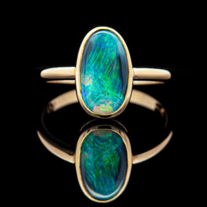 Australian Semi-Black Opal Ring Bezel Set in Yellow Gold by World Treasure Designs