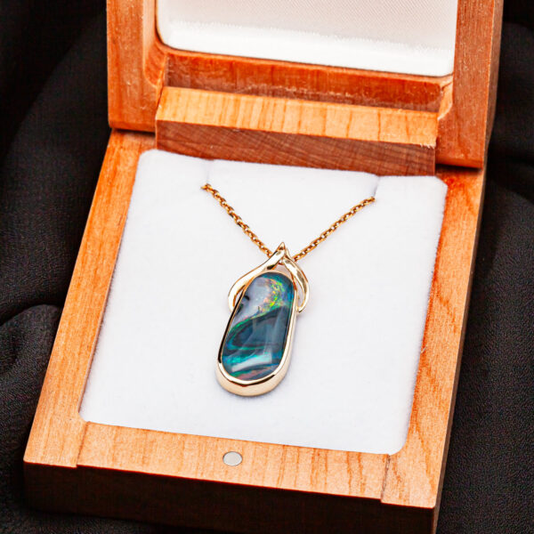 Swirl Oval Australian Semi-Black Opal Necklace Bezel Set in Yellow Gold by World Treasure Designs